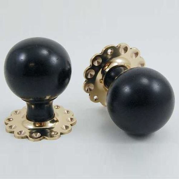 DKF084MXF-PBL  Ebony / Lacquered Brass  Timber Sphere Knobs On Daisy Roses