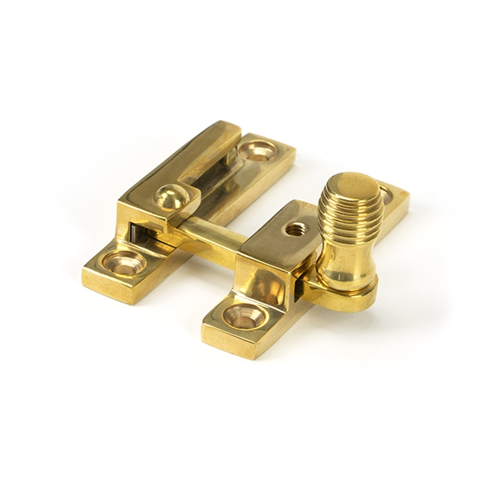 45992 • 64mm • Polished Brass • From The Anvil Beehive Quadrant Fastener - Narrow