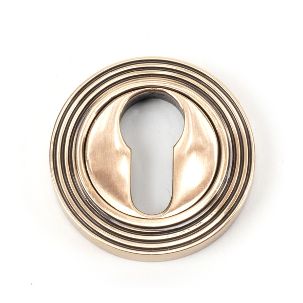 46127  53mm  Polished Bronze  From The Anvil Round Euro Escutcheon [Beehive]