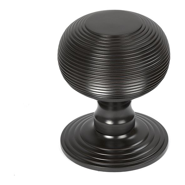 46657 • 80mm • Aged Bronze • From The Anvil Beehive Centre Door Knob