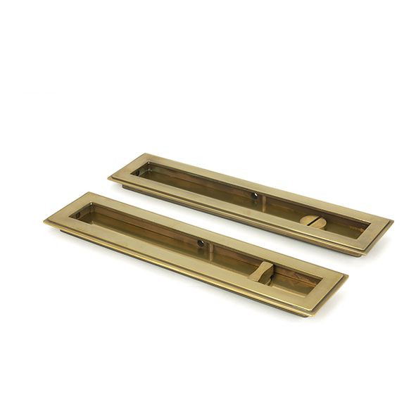 48309 • 250mm • Aged Brass • From The Anvil Art Deco Rectangular Pull - Privacy Set