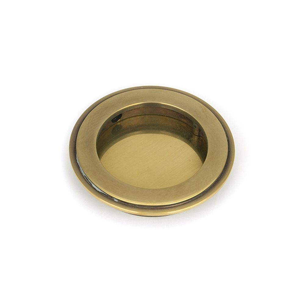 48317  75 mm  Aged Brass  From The Anvil Art Deco Round Pull