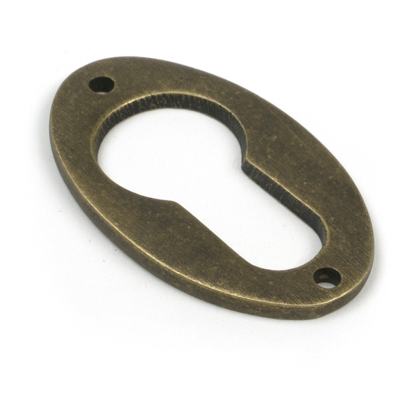 52457 � 51 x 31mm � Burnished Brass � From The Anvil Oval Euro Escutcheon