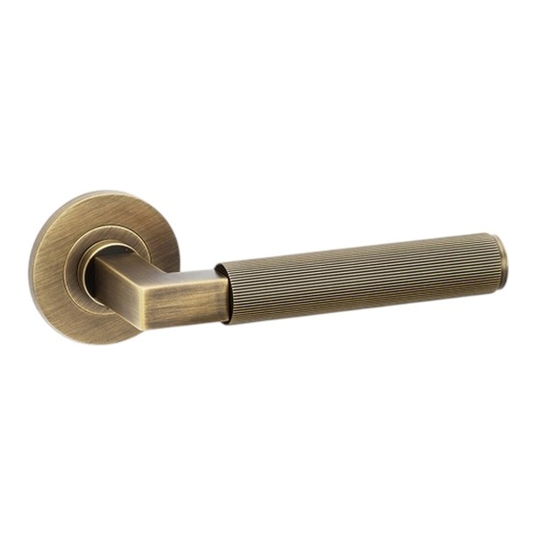 AW202AB  Antique Brass  Alexander & Wilks Hurricane Reeded Levers on Round Roses