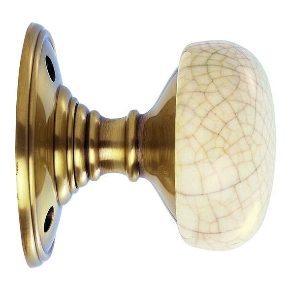 DK34ICFB • Florentine Bronze Rose • Delamain Ivory Crackle Mortice Knobs On Round Roses