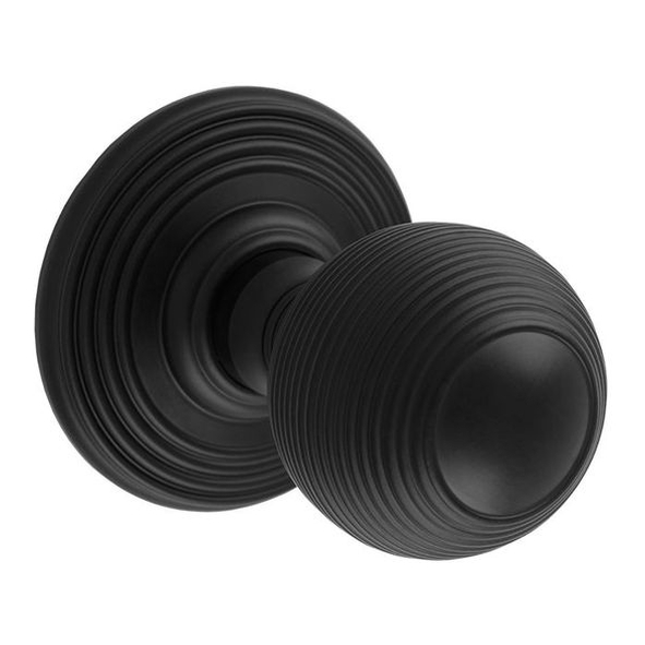 DK37CMB  Matt Black  Delamain Reeded Mortice Knobs On Concealed Fix Round Roses