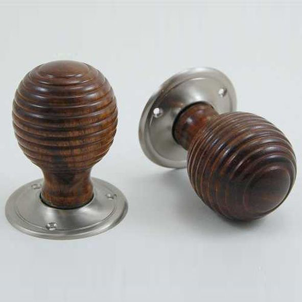 DKF081DWC-SNP • Rosewood / Satin Nickel • Timber Beehive Knobs On Round Roses