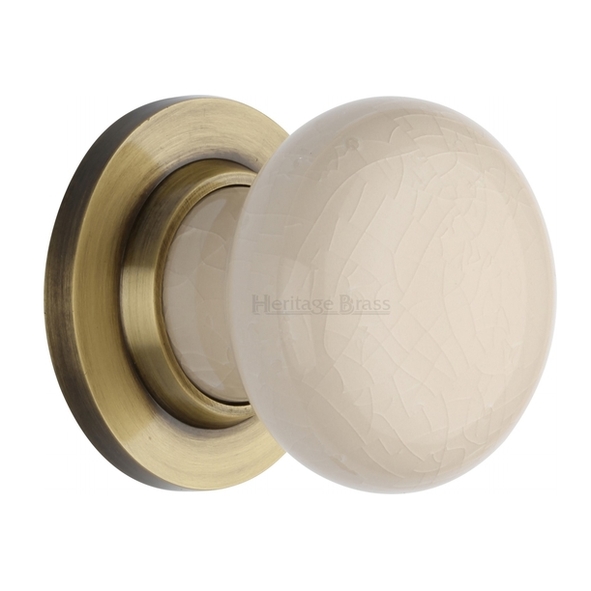 8010-AT • Antique Brass Rose • Heritage Brass Porcelain Cream Crackle Knobs On Round Roses